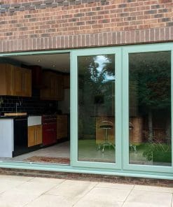 green easifold doors on brick house