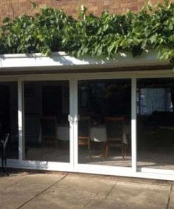 External view of closed White uPVC Sliding 4 Pane Patio Door