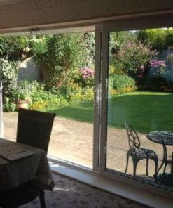 Internal view of open White uPVC Sliding 4 Pane Patio Door