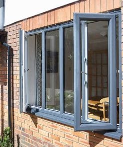 Open grey uPVC window - external view on house