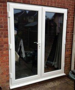 external view of white uPVC french doors from AWM glass and glazing